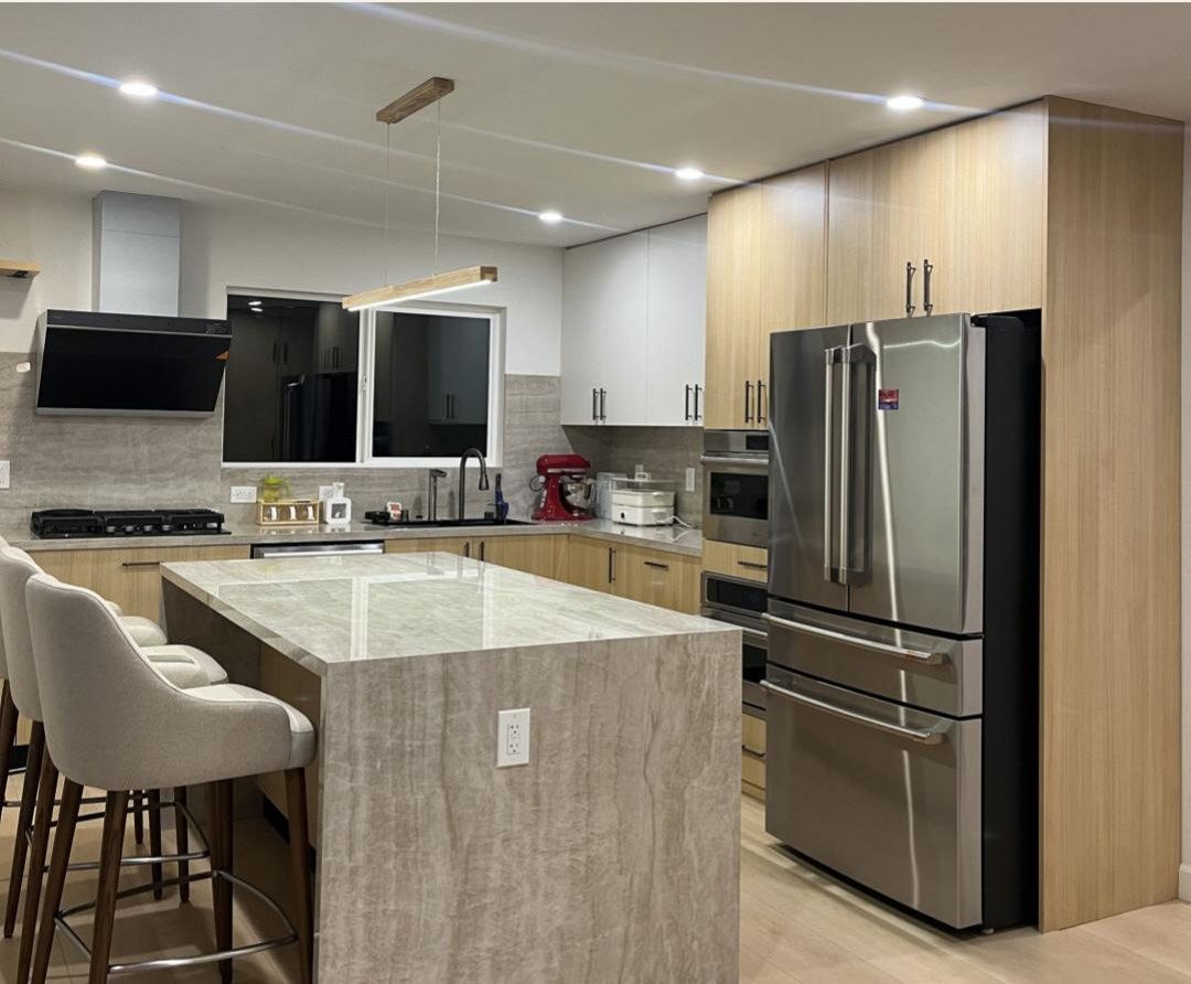 Kitchen cabinetry and stone island sourced from Foshan